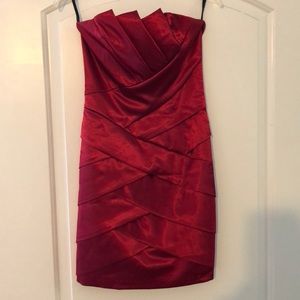 Short red form fitting dress